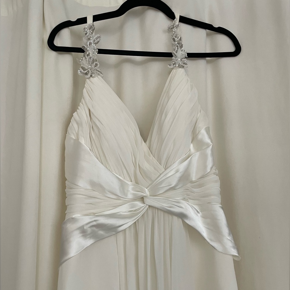 Chiffon tank gown ruched bodice with vneck and detailed floral straps.